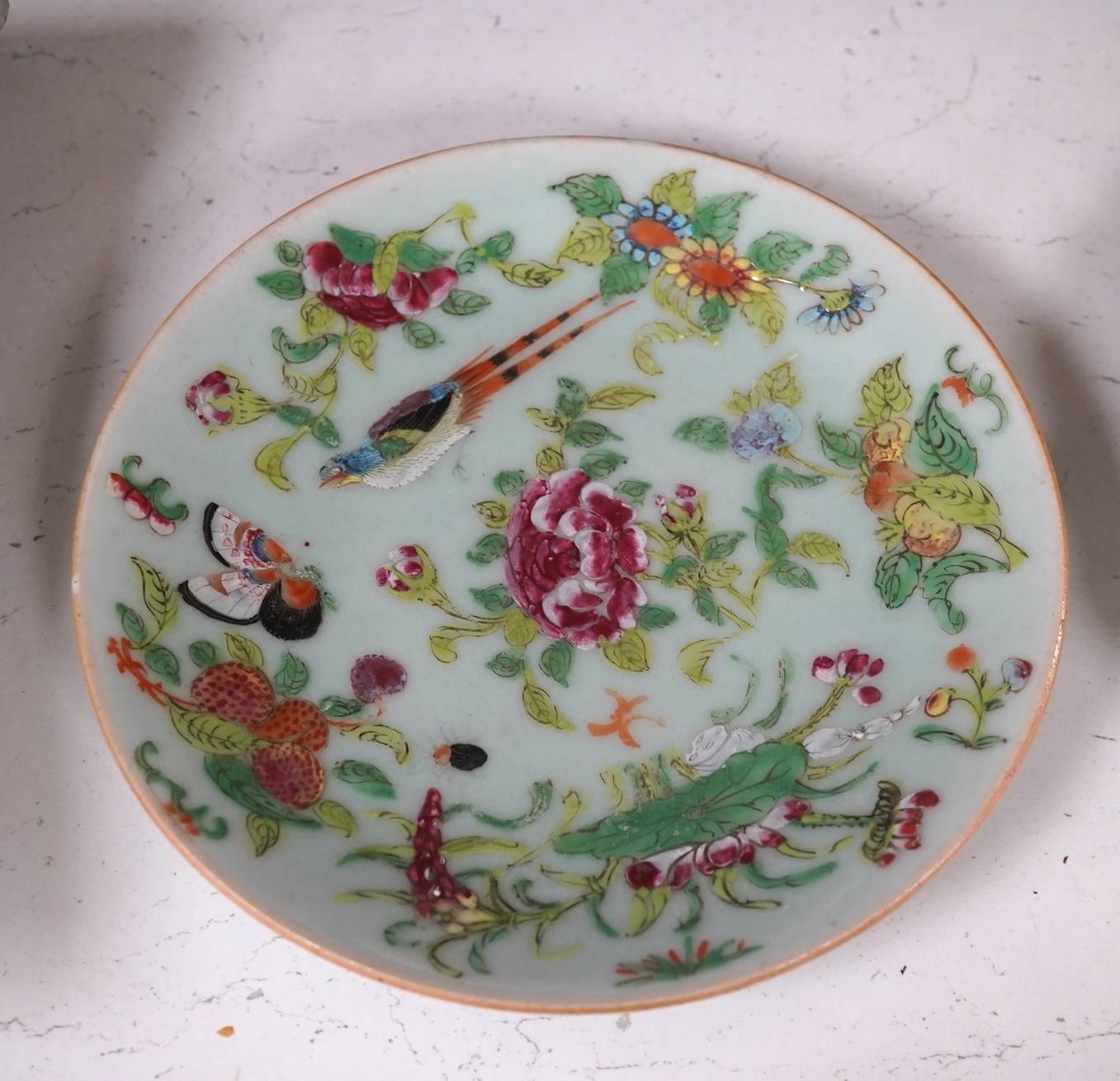 A 19th century Chinese blue and white 'prunus' vase, a Chinese green glazed jar, a Japanese vase and two dishes and two Canton famille rose plates (7). Condition - fair to good